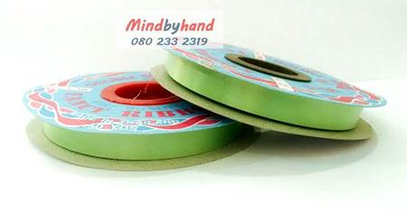 ริบบิ้นพับเหรียญโปรยทาน