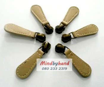 หัวซิปรุ่นแผ่นหนัง (สำหรับซิปฟันเหล็ก)