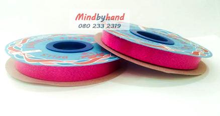 ริบบิ้นพับเหรียญโปรยทาน