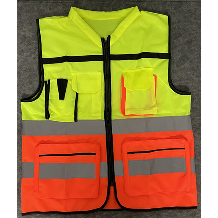 สะท้อนกั๊กสะท้อนแสง ขนาดฟรีไซส์รอบอกประมาณ 46 นิ้วเสื้อผ้ายาว 26.5 นิ้ว มีสีเขียวอ่อน-ดำ,สีส้ม-ดำ,เขียวตองอ่อน-ดำ,สีเขียว-ส้ม,สีเหลือง-ดำ,สีน้ำเงิน-ดำ