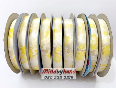 ริบบิ้นพับเหรียญโปรยทาน ลายดอกไม้ขาว