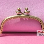 ขอบกระเป๋าปิ๊กแป๊ก 4"กว่า ๆ สีทองรมควัน ที่บิดรูปเป็ด